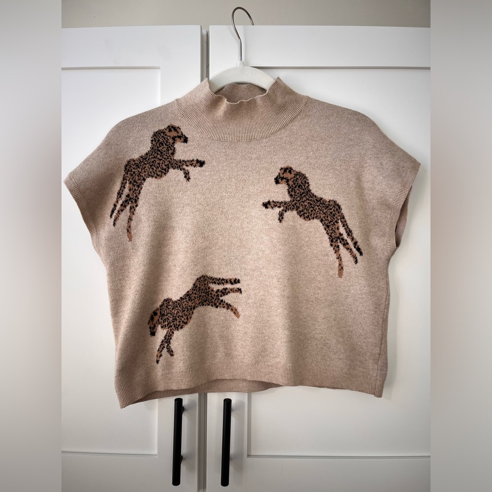 Tan Sweater vest with cheetahs!